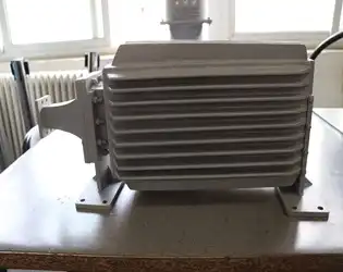 In the design of waveguide terminations, what factors need to be considered to optimize performance indicators such as VSWR, insertion loss, and power handling capacity?